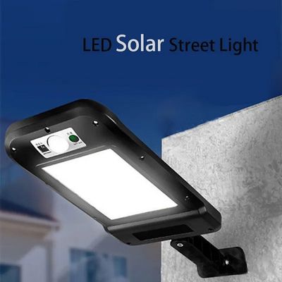 ABS Solar Powered LED Street Lights 4 COB Solar Sensor Flood Light PS 2pcs Lithium 18650 1200mAh